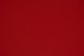 red textile in close up photography