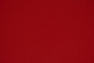 red textile in close up photography