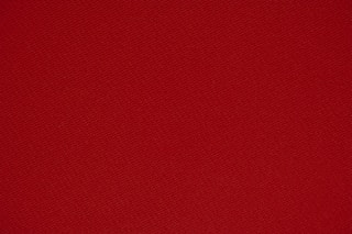 red textile in close up photography