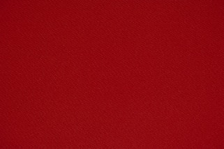 red textile in close up photography