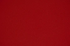 red textile in close up photography