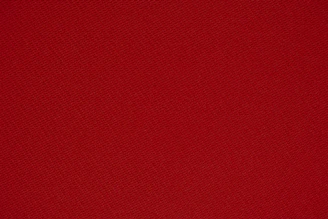 red textile in close up photography