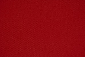 red textile in close up photography
