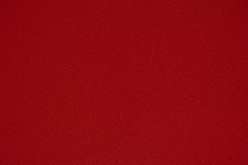 red textile in close up photography