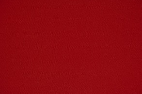 red textile in close up photography