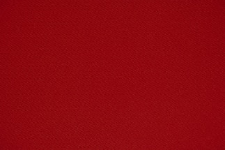 red textile in close up photography