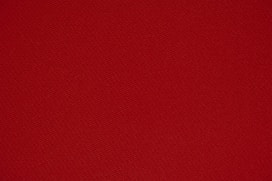 red textile in close up photography
