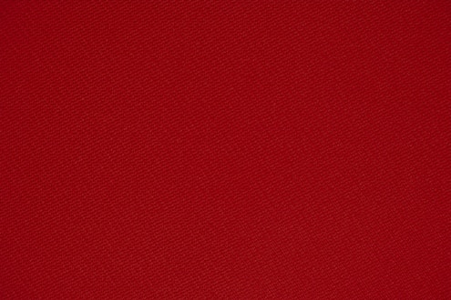 red textile in close up photography