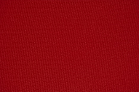 red textile in close up photography
