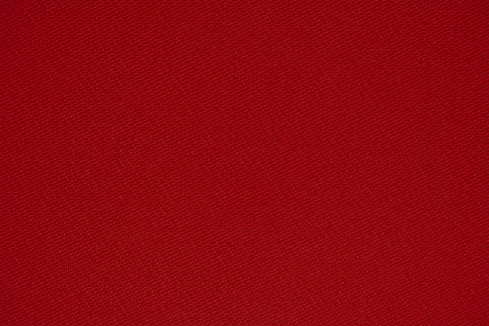 red textile in close up photography
