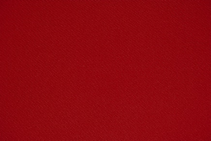 red textile in close up photography
