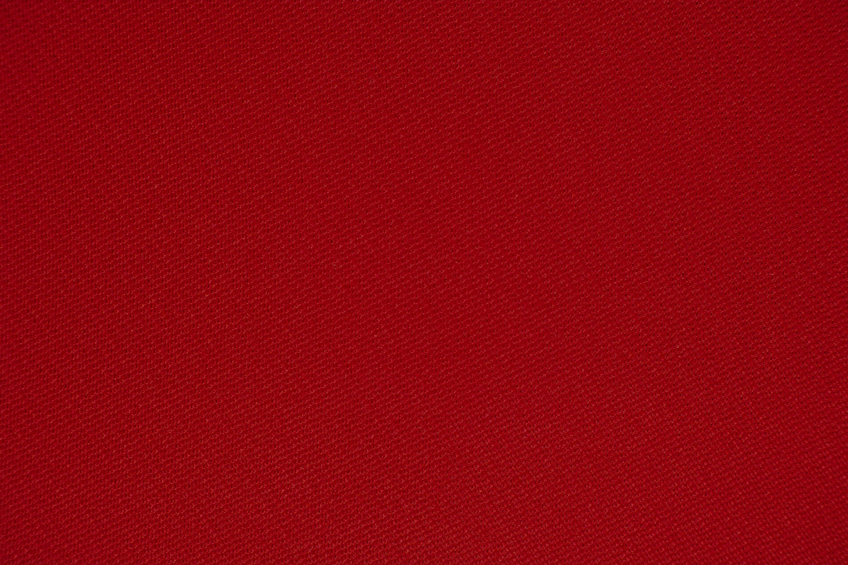 red textile in close up photography