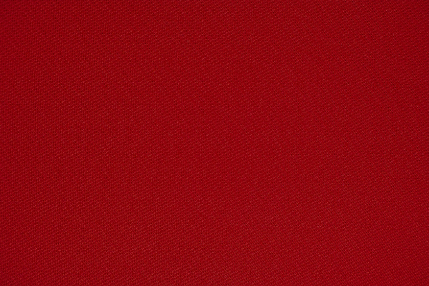 red textile in close up photography