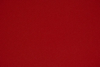 red textile in close up photography