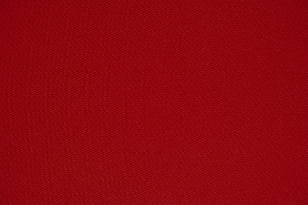 red textile in close up photography