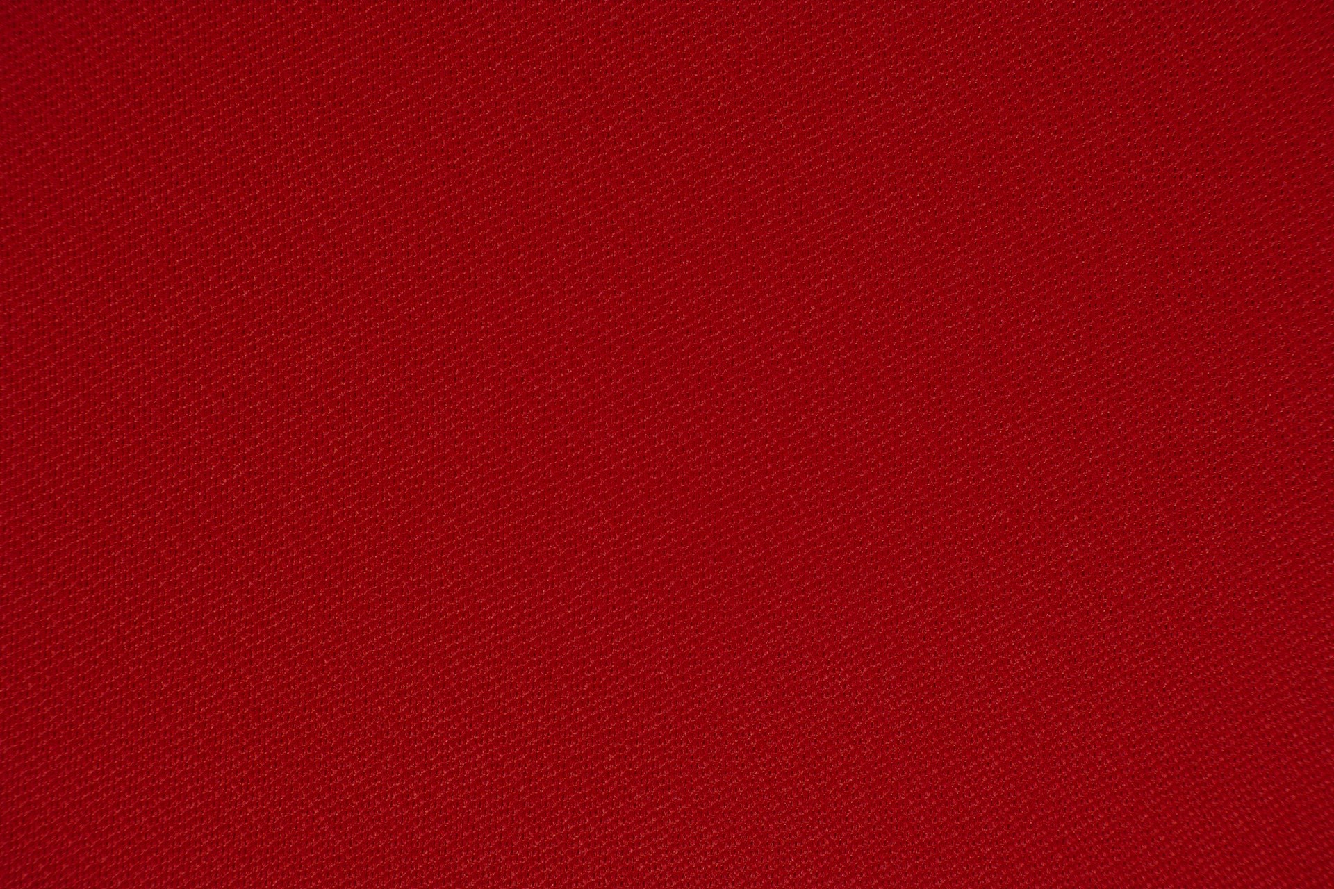 red textile in close up photography