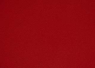 red textile in close up photography