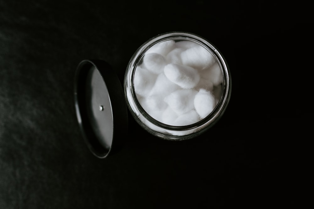 white round container with white liquid