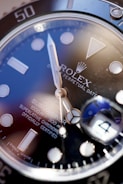 blue and silver round analog watch