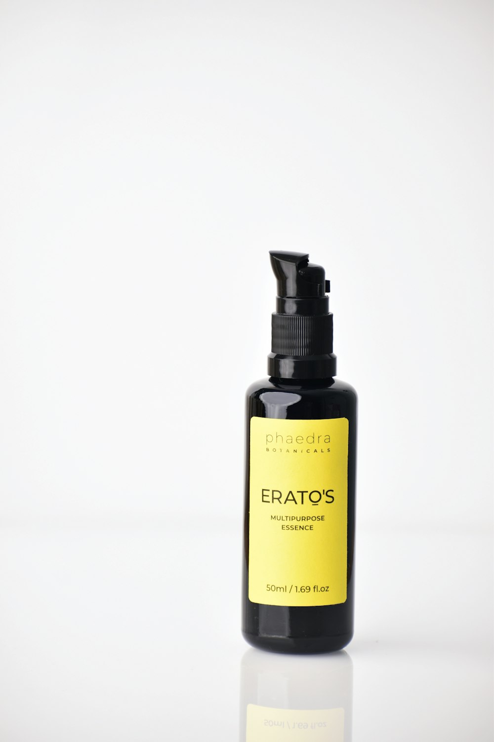 a bottle of eratos on a white surface