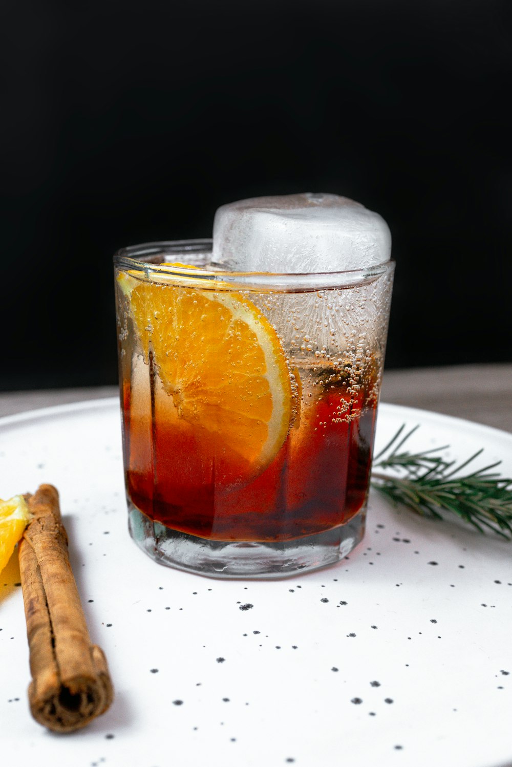 clear drinking glass with orange juice