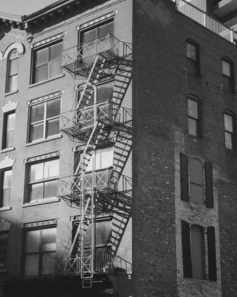 grayscale photo of concrete building