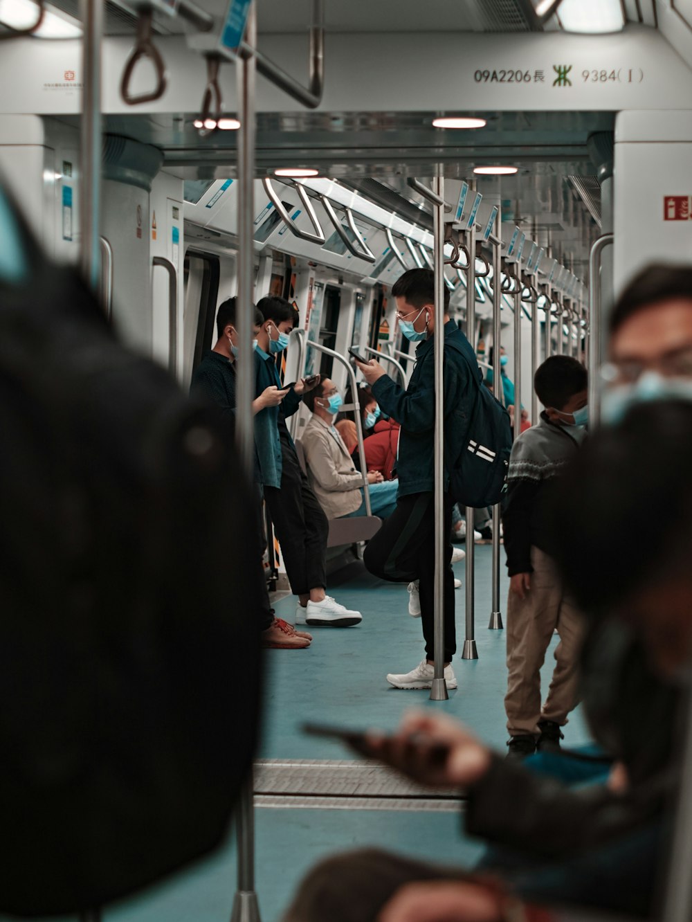 people in train during daytime