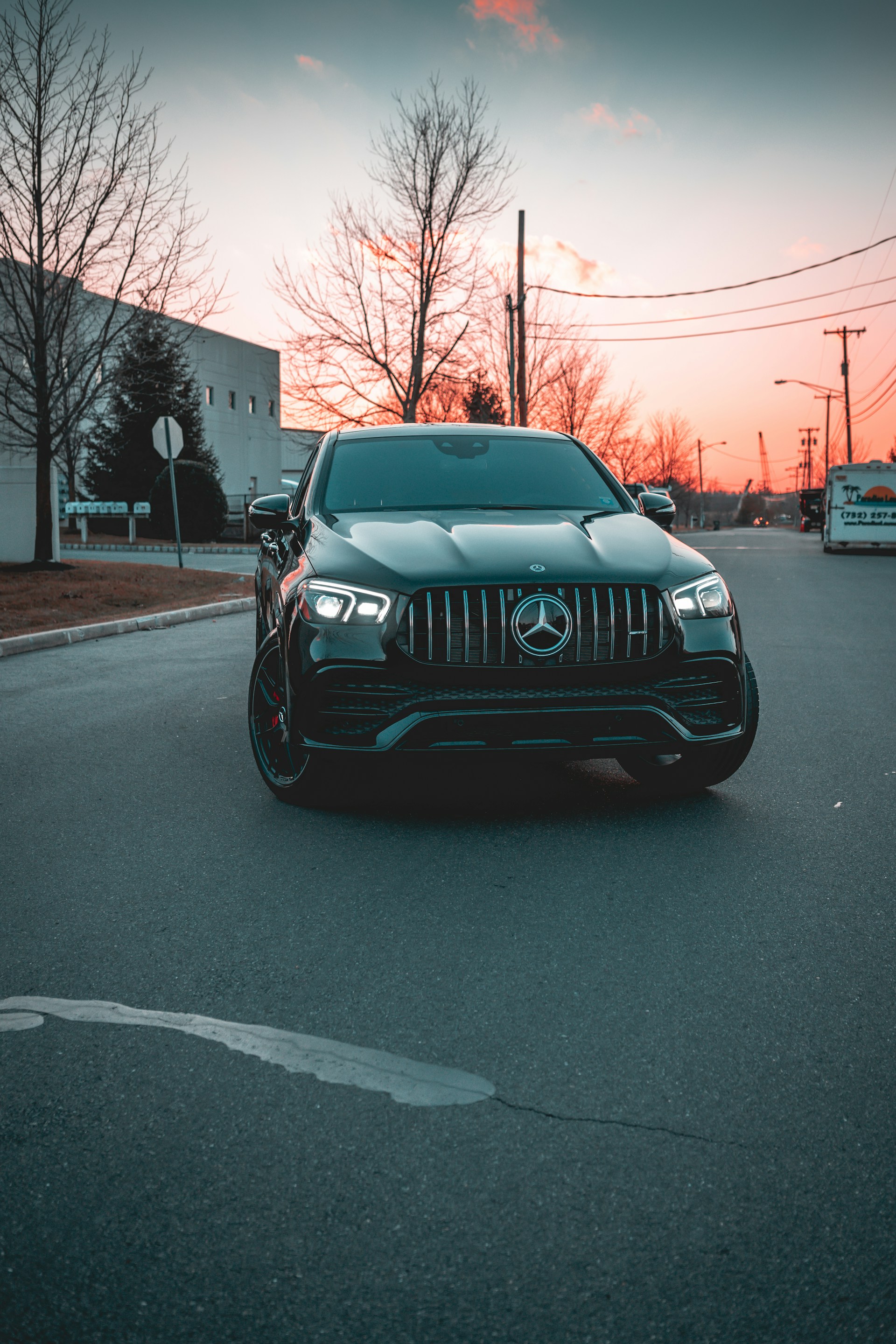 black and brown leather padded tub sofa