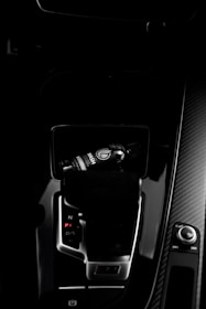 A clean car interior showcasing shiny surfaces and spotless upholstery.