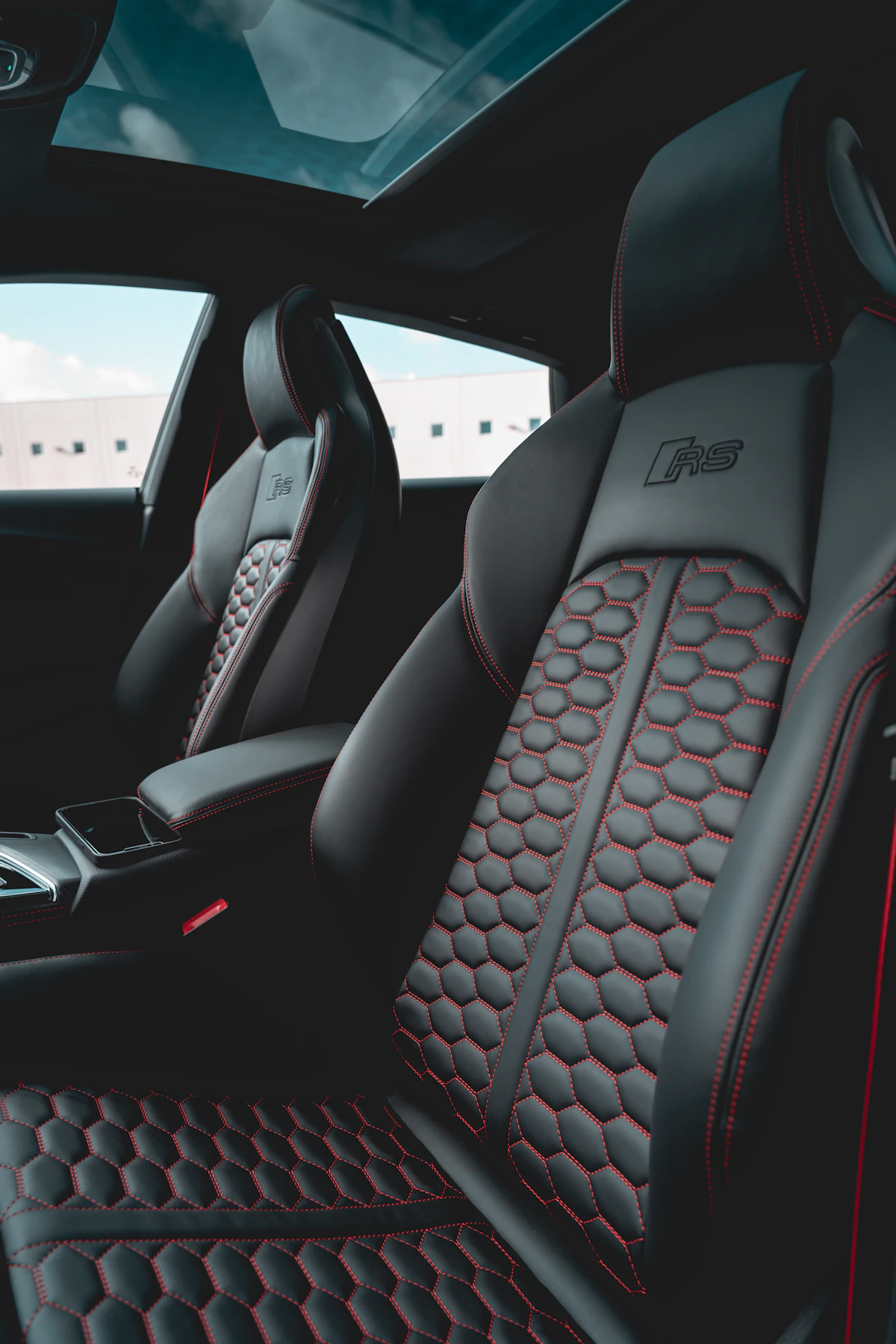 Close-up of premium car upholstery showing detailed leather stitching