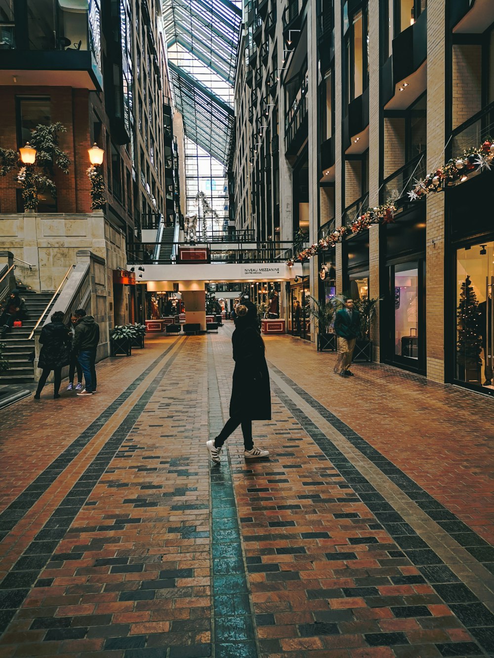 people walking on sidewalk during daytime