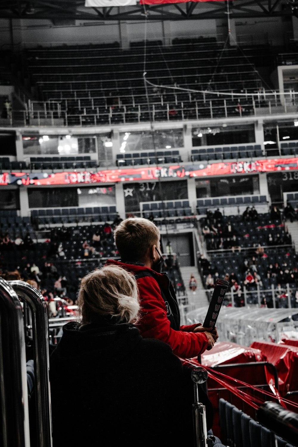 people watching a game on a stadium