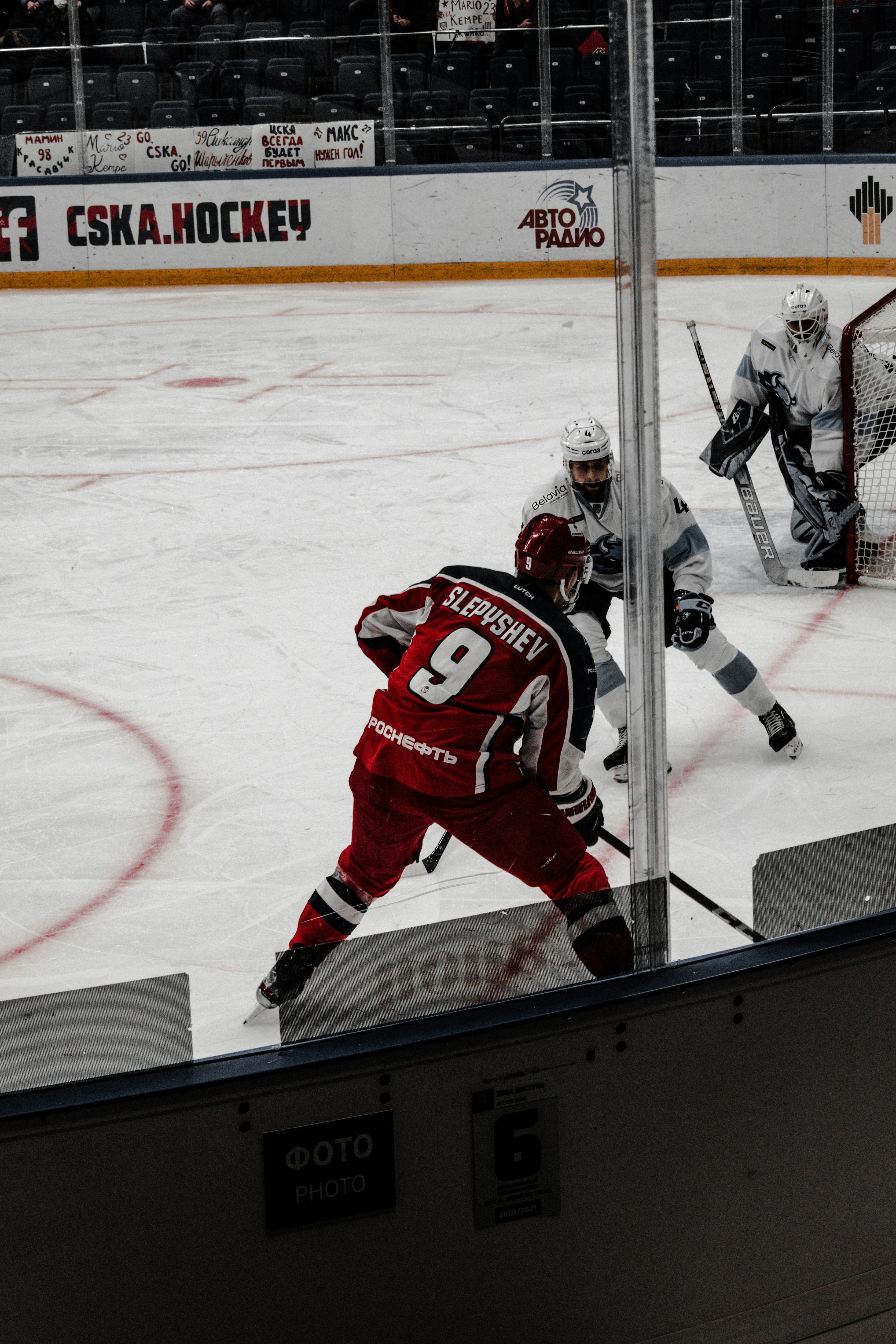 ice hockey players on ice hockey field