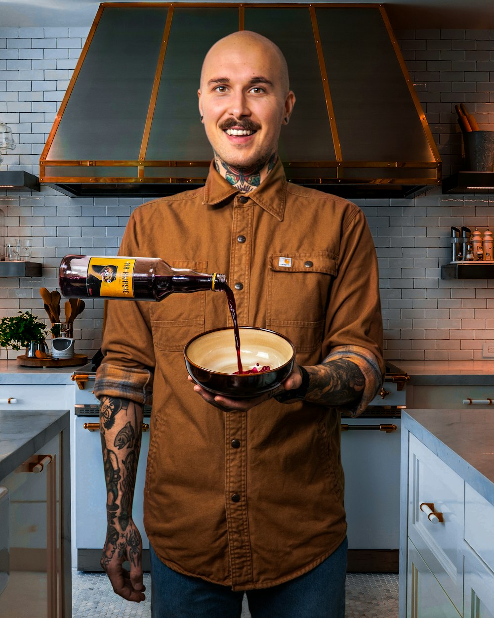 man in brown leather jacket holding black and white ceramic mug