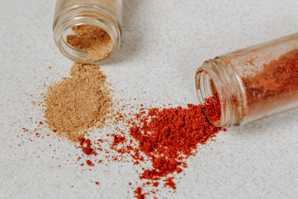 brown powder in clear glass jar