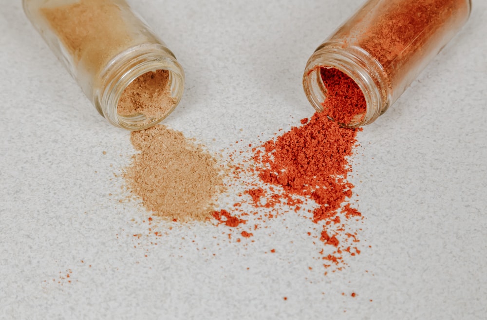 brown powder on clear glass jar