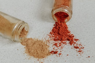 brown powder on clear glass jar