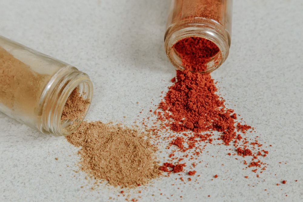 brown powder on clear glass jar