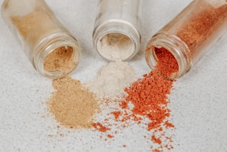 brown powder in clear glass jar
