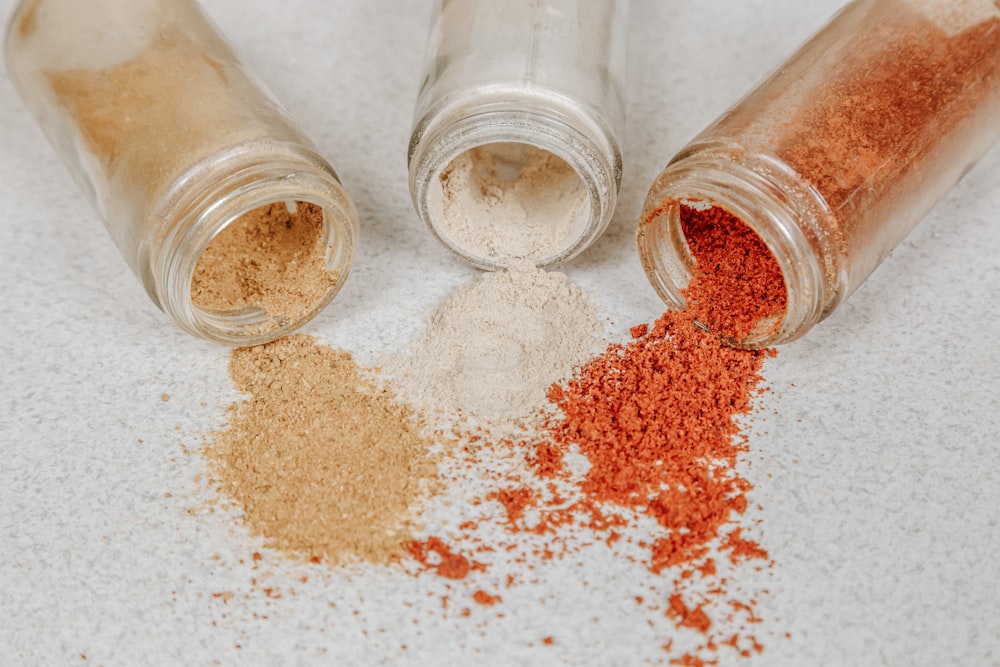 brown powder in clear glass jar