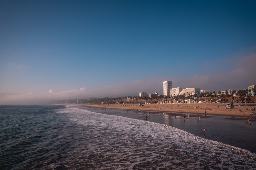 city skyline across the sea during daytime