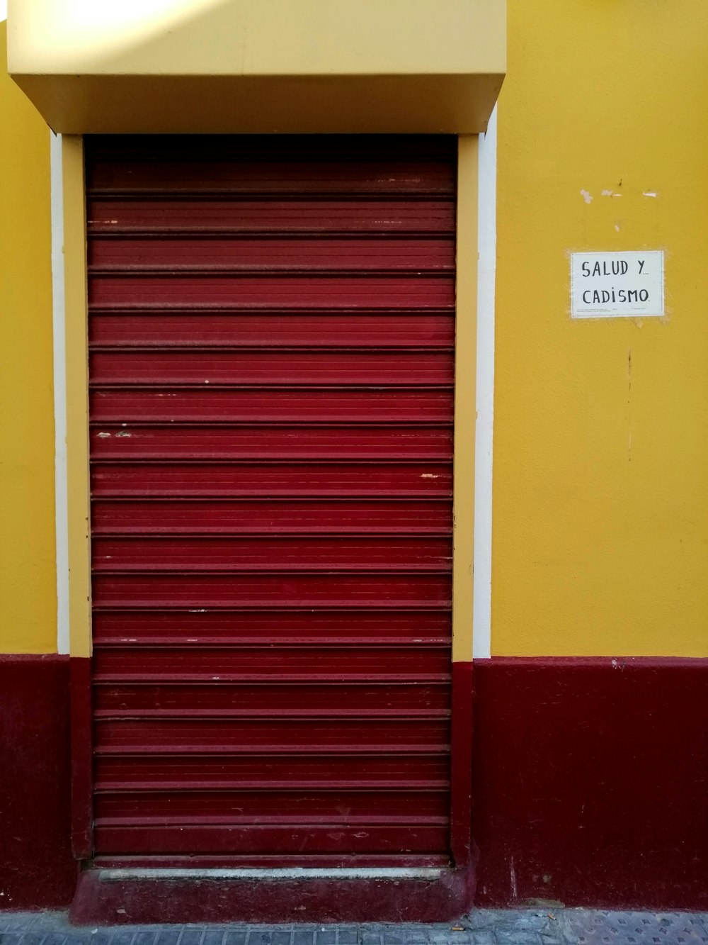 red and yellow wooden door