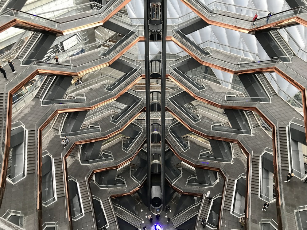 black and silver escalator in a building
