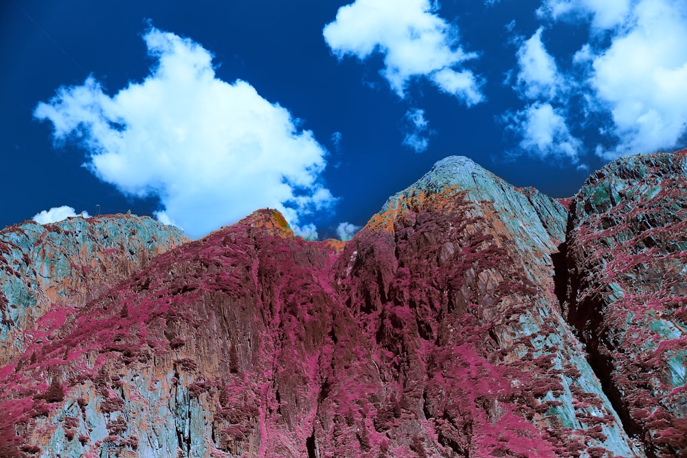 brown rocky mountain under blue sky during daytime