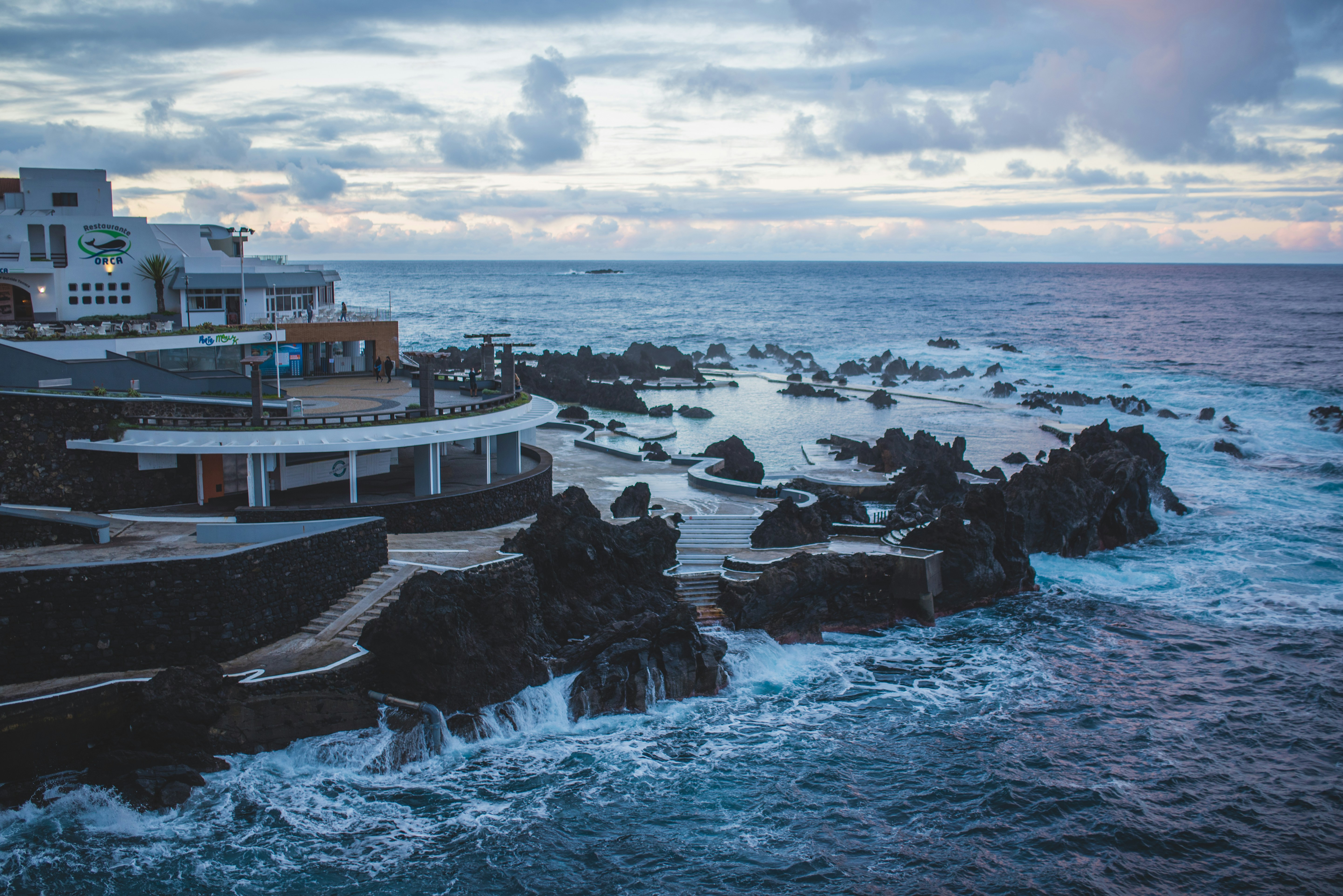 white and black boat on sea during daytime, Porto Moniz