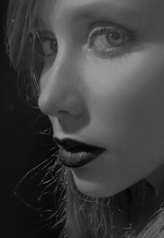 woman with black eyes and white eyes