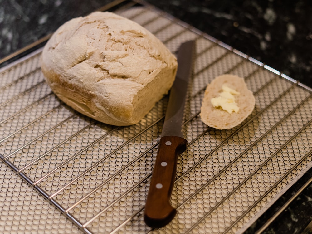 bread on white and black checkered textile