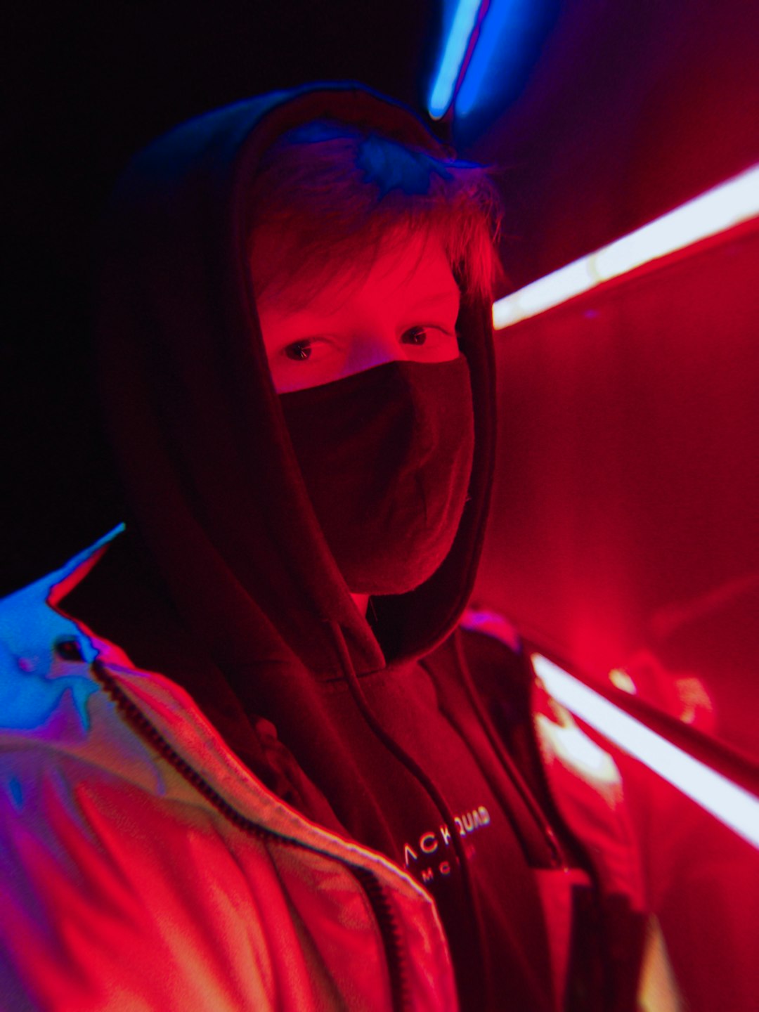 woman in white hoodie with face paint