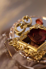 Close-up of a delicate 1970s miniature painting framed in an elegant vintage style.