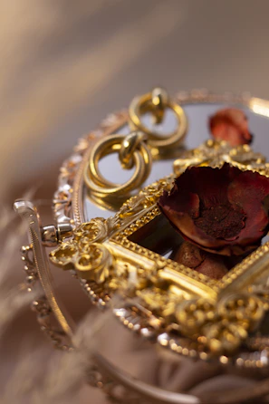 Artistic shot of a modern frame detail with golden edges complementing a canvas painting.